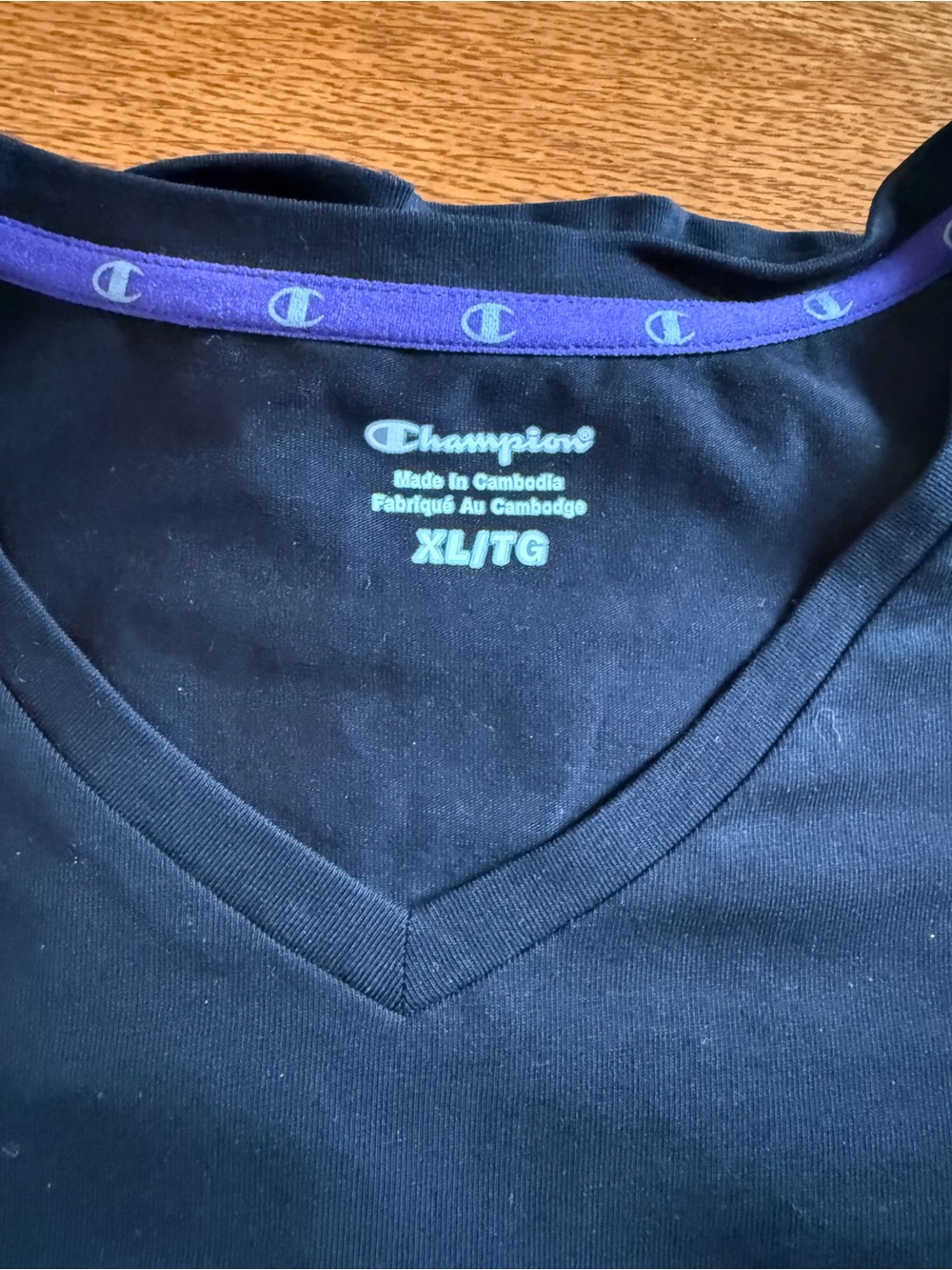 Champion  Black V-Neck Tee with Purple Neckband Accent